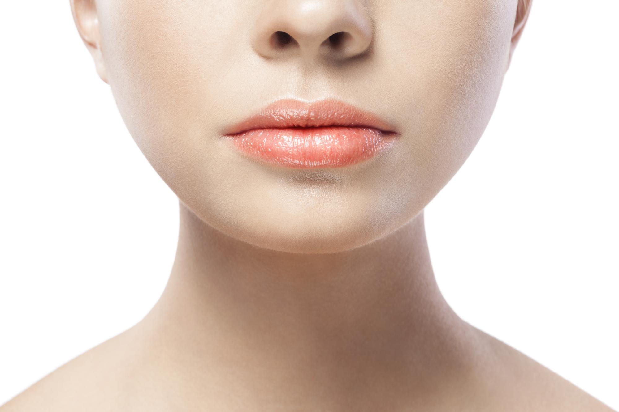 closeup portrait of young woman with beautiful lips